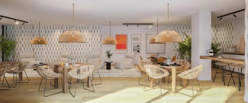 Interior del salón social multiusos, un espacio para reuniones y eventos privados de los vecinos, equipado y diseñado con estética contemporánea.